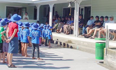 Russell School performing for the tour participants