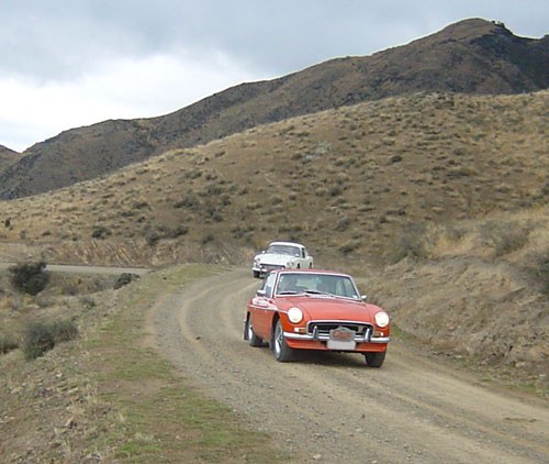 MGB & GT6 on farm track