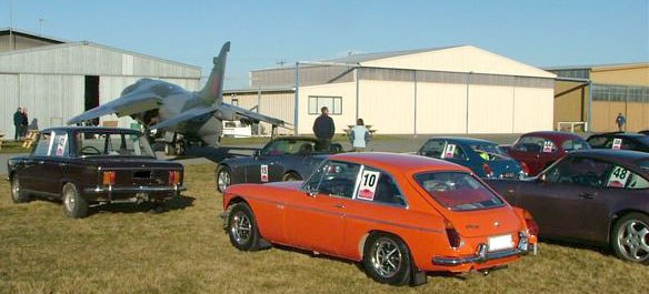 Lineup of cars at Ashburton Aviation Museum & the Harrier!