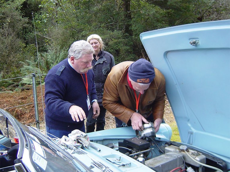 Scott and Hugh rummaging under the bonnet